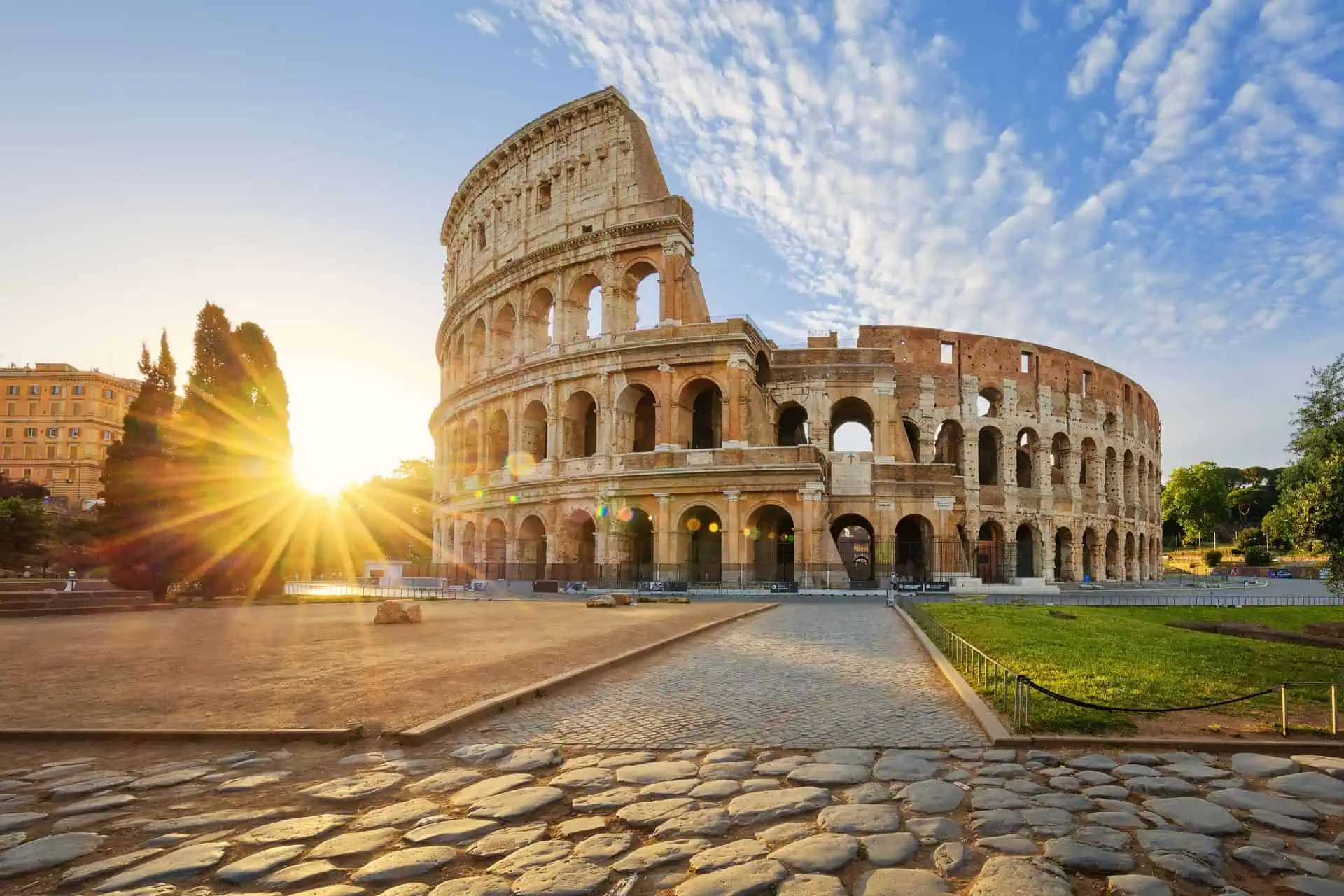 Panoramic view of Rome, Italy with historic landmarks, ancient architecture, and traditional buildings under a bright sky